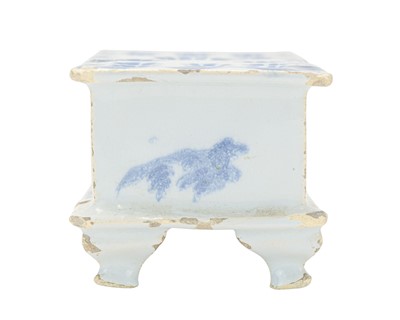 Lot 711 - A rare English Delft flower brick.
