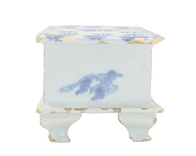 Lot 711 - A rare English Delft flower brick.