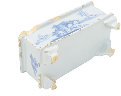 Lot 711 - A rare English Delft flower brick.