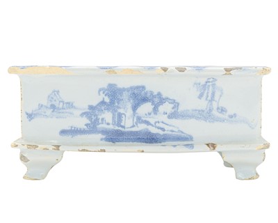 Lot 711 - A rare English Delft flower brick.