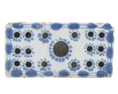 Lot 711 - A rare English Delft flower brick.