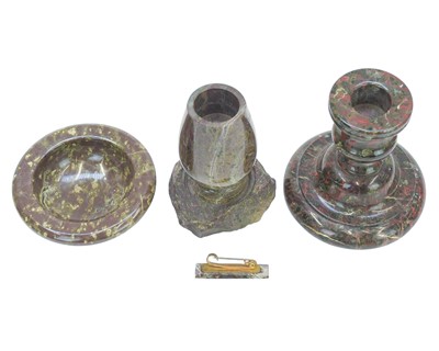 Lot 108 - A Cornish serpentine candlestick.
