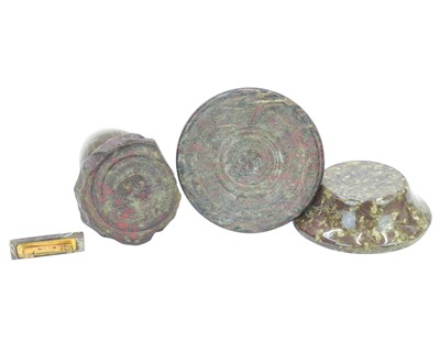 Lot 108 - A Cornish serpentine candlestick.