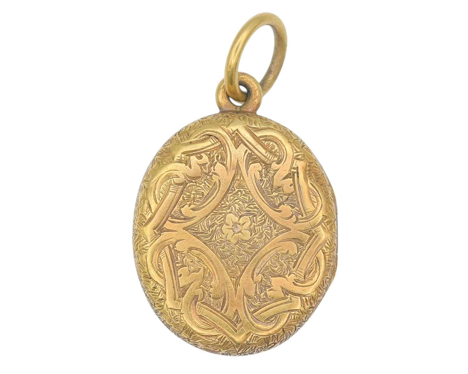 Click H Locket Lot 2 - A Victorian gold oval locket with foliate