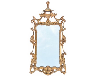 Lot 794 - An Italian carved gilt wood framed wall mirror.