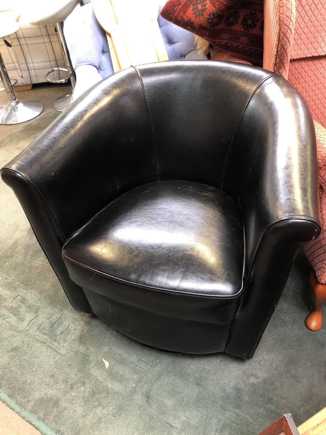 Lot 368 - A black leather tub chair