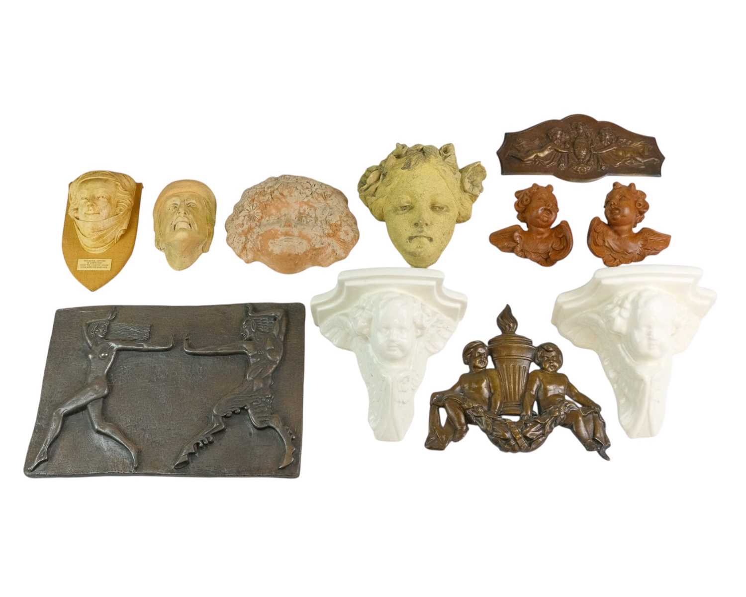 Lot 144 - A collection of wall plaques and sconces.