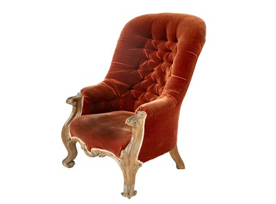 Lot 825 - A substantial early Victorian mahogany upholstered armchair.