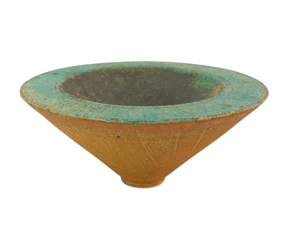 Lot 517 - A stoneware bowl of conical form.