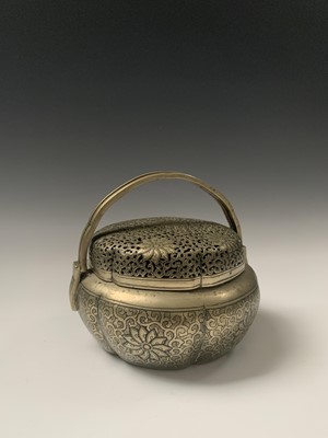 Lot 4 - A Chinese bronze hand warmer, Qing Dynasty,...