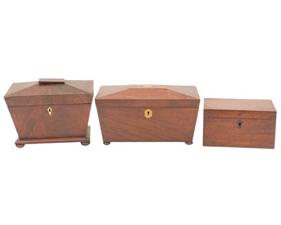 Lot 150 - A 19th century mahogany sarcophagus shape tea caddy.