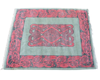 Lot 471 - A Celtic knot patterned carpet.