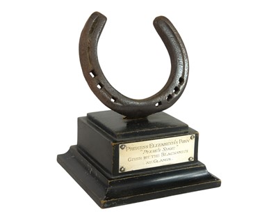 Lot 8 - Queen Elizabeth II royal interest, Pixie's pony shoe.
