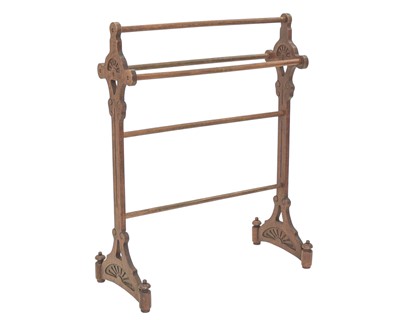Lot 905 - An Arts and Crafts oak towel rail.