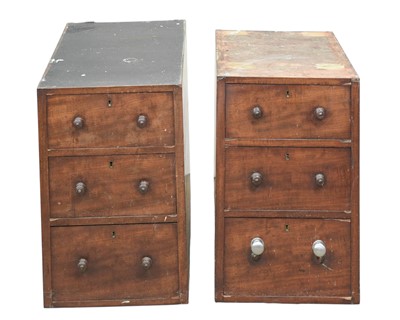 Lot 877 - A pair of mahogany pedestals.