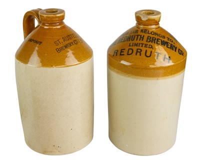 Lot 30 - Four Cornish stoneware flagons.