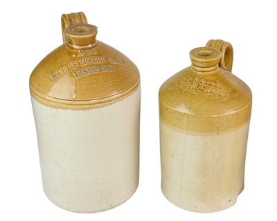 Lot 30 - Four Cornish stoneware flagons.