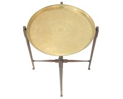 Lot 34 - An Eastern brass topped tray table.