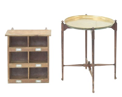 Lot 34 - An Eastern brass topped tray table.