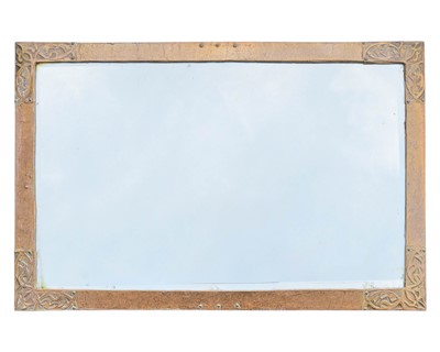Lot 655 - An Arts and Crafts wall mirror, early 20th century.