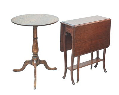 Lot 862 - An elm tripod wine table.