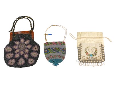 Lot 355 - Three beaded handbags.