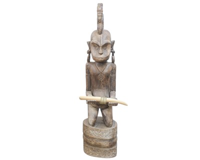 Lot 158 - A large carved West African tribal figure.