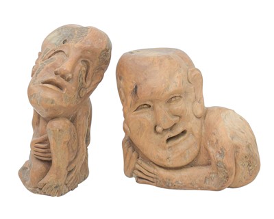 Lot 157 - Two hardwood carved grotesque busts.