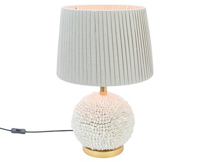 Lot 781 - An Oka Cowrie shell table lamp.