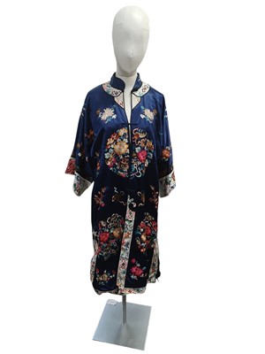 Lot 421 - A Chinese embroidered silk jacket.