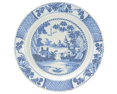 Lot 730 - An English blue and white Delft platter.