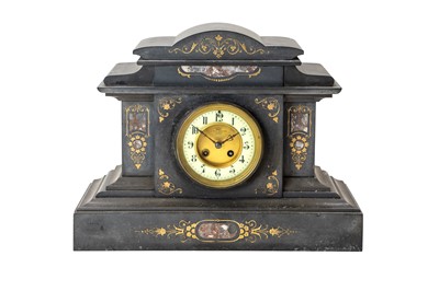 Lot 779 - A French black slate mantel clock.