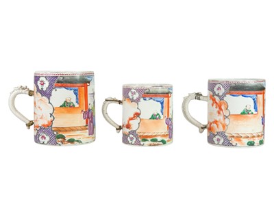 Lot 319 - A suite of three Chinese Mandarin pattern export mugs.
