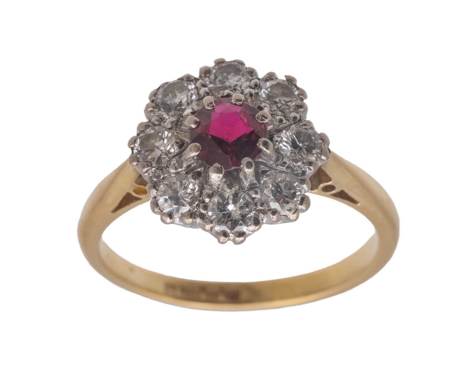 Lot 22 - An attractive early 20th-century 18k yellow and white gold ruby and diamond set cluster ring.