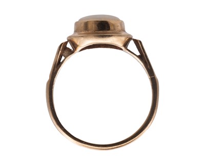 Lot 43 - A 9k hallmarked gold oval white opal set ring.