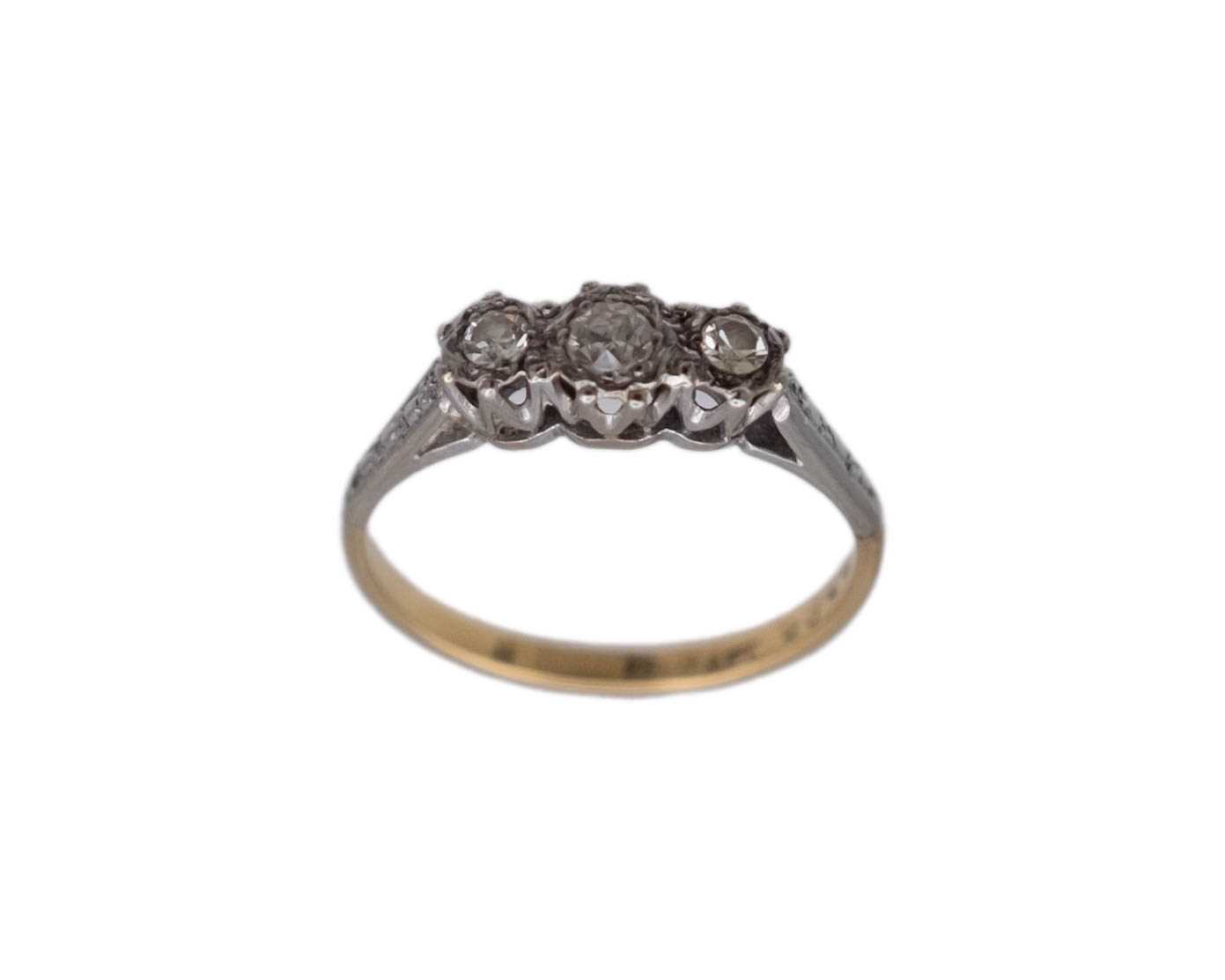 Lot 36 - An 18k and platinum diamond set three-stone ring.