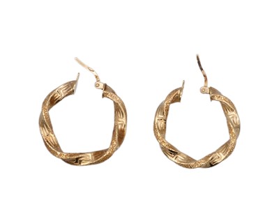 Lot 42 - A pair of 18k Greek key twist design hoop earrings.