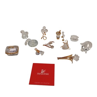 Lot 30 - Assorted Swarovski figures and two brooches in...