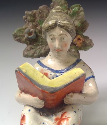 Lot 829 - A 19th century Staffordshire figure of a girl...