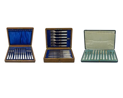 Lot 219 - A set of mother-of-pearl and silver-handled dessert cutlery by Harrison Brothers & Howson.