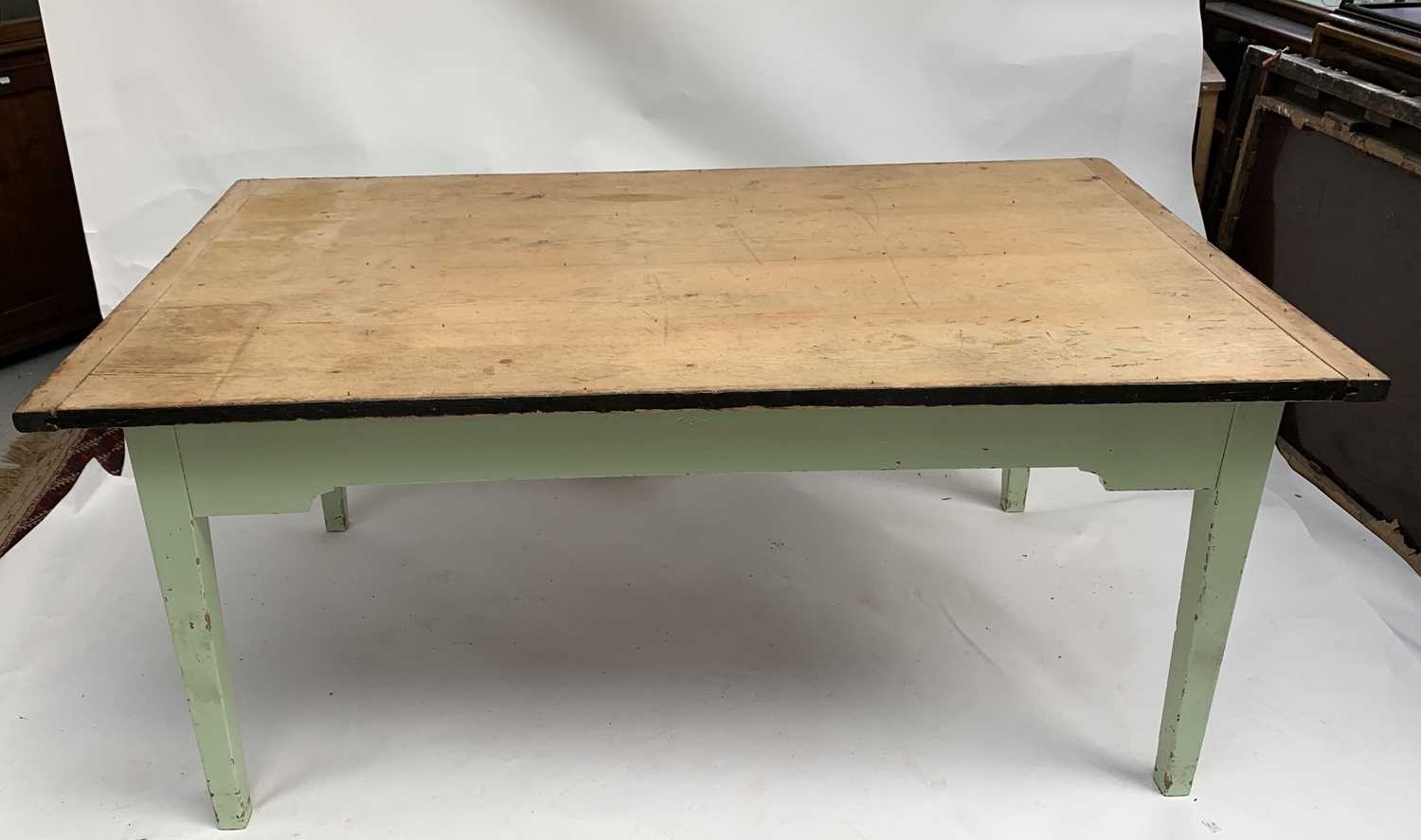 Lot 3026 - A scrub top kitchen table, 1920s, raised on a...