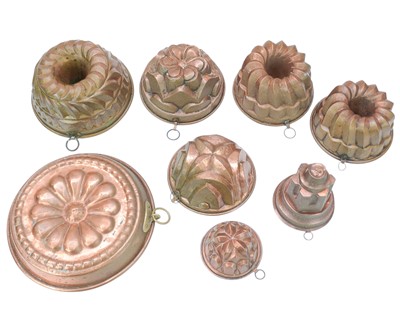 Lot 20 - Eight copper jelly moulds.