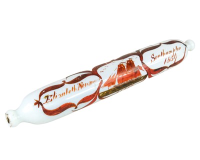 Lot 138 - A Victorian Nailsea type sailor's sweetheart opaque glass rolling pin.