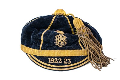 Lot 297 - A plush velvet rugby sports cap.