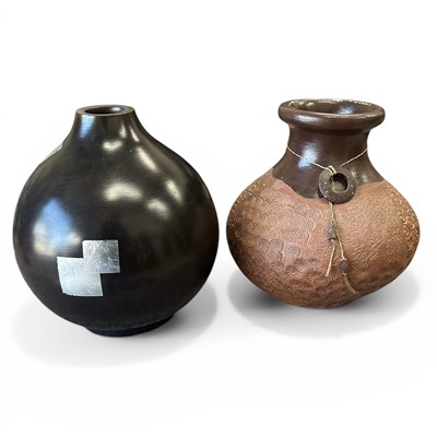 Lot 67 - A terracotta decorated pot from the...