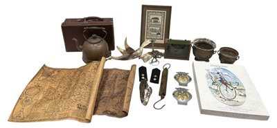 Lot 56 - A wooden disc or wheel wrapped in iron and set...