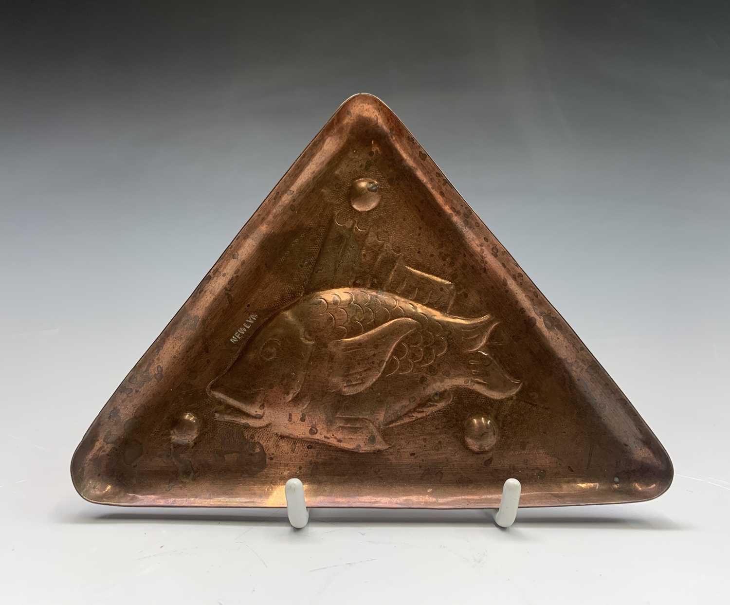 Lot 241 - A Newlyn copper pin tray of triangular form,...
