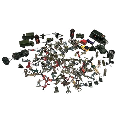 Lot 79 - A selection of military figures and vehicles,...