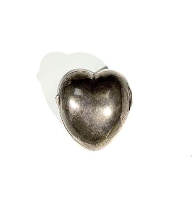 Lot 2395 - A Tiffany silver heart box with hinged lid,...