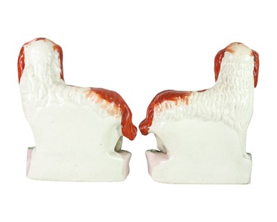 Lot 683 - A rare pair of Staffordshire spaniels.